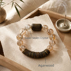 Exclusive Agarwood and Super Seven Crystal bracelet with warm wood texture and golden crystal inclusions