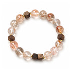 Agarwood and Super Seven Crystal bracelet with geometric wood beads and layered crystal inclusions